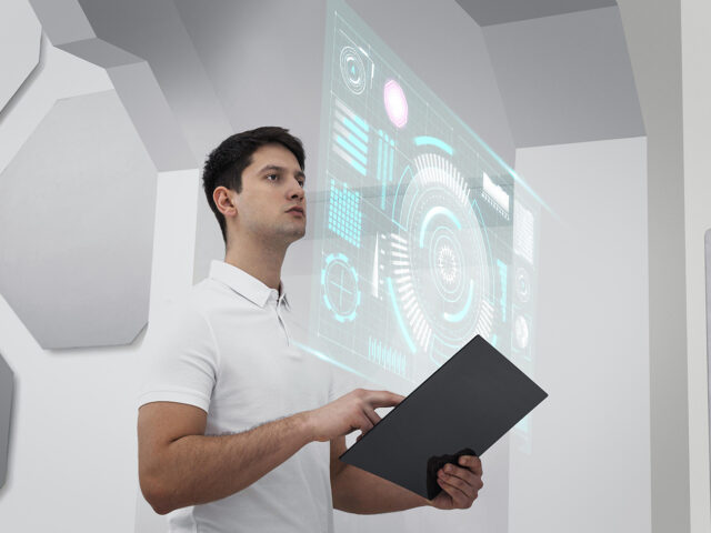 medium-shot-man-holding-device-640x480.jpg